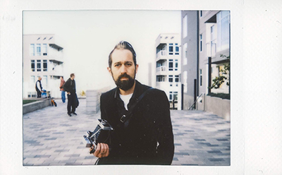 Portrait of the author by MB Moore on Instax Mini